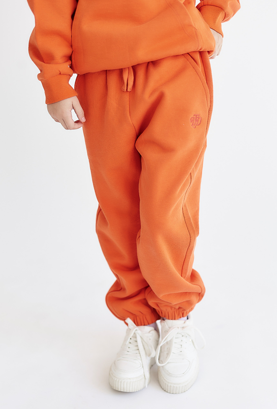 Pomarańczowe spodnie dresowe  - unisex - Limited Edition