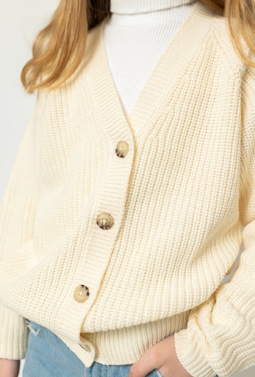 Dziewczęcy kardigan w kremowym kolorze