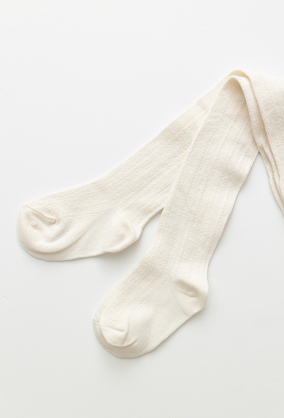 Rajstopy dziewczęce grube – białe, ze strukturą.