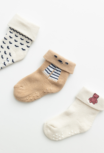 Skarpetki niemowlęce 3-pak z ABS i wywinięciem – ecru.