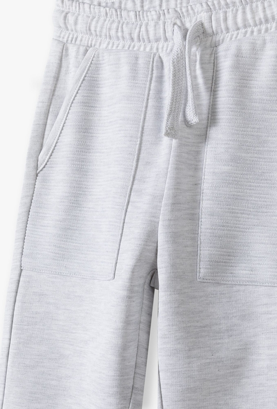 Szare dresowe spodnie slim z dużymi kieszeniami - 5.10.15.