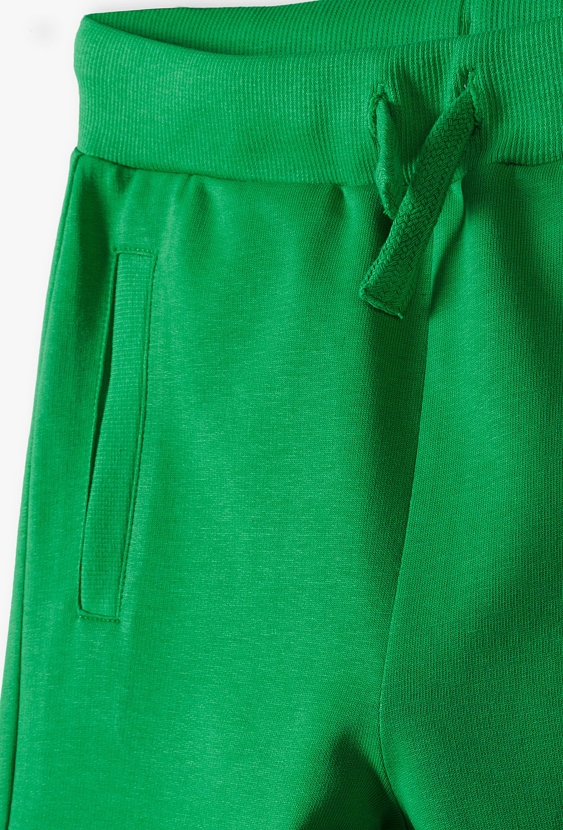 Zielone dresowe spodnie slim dla dziecka - 5.10.15.