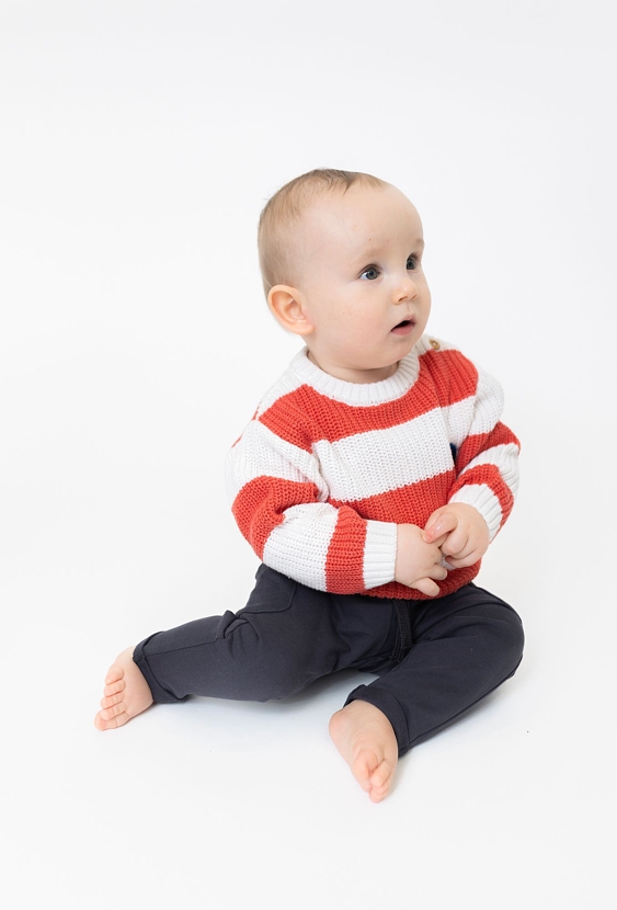 Sweter niemowlęcy w paski