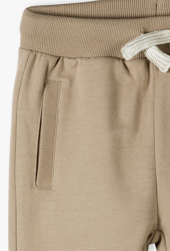 Spodnie dresowe slim z kieszeniami - brązowe - 5.10.15.