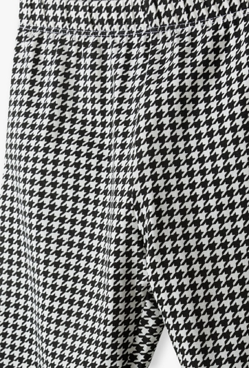 Dzianinowe leginsy dla dziewczynki - biało-czarna pepitka