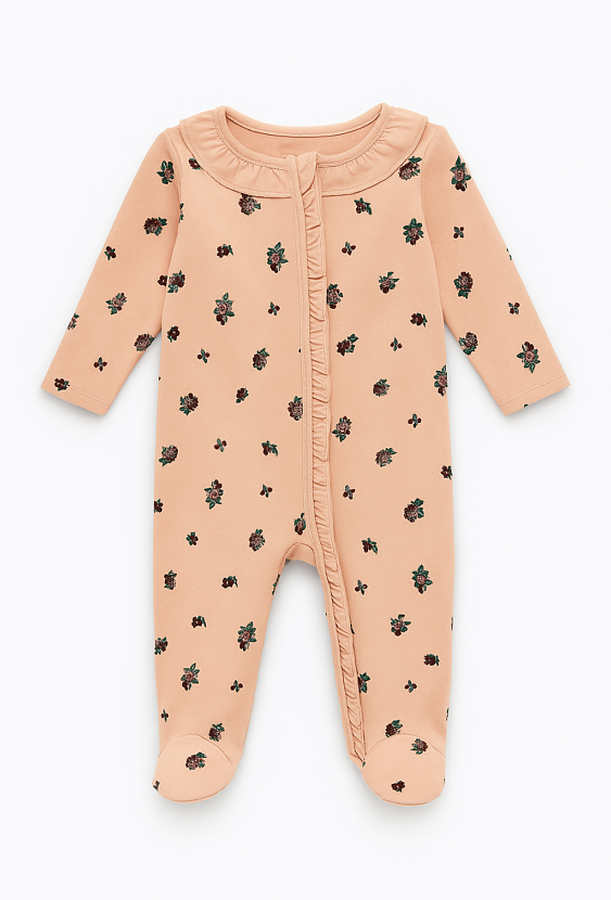 Pajac niemowlęcy dziewczęcy w kwiatki z falbanką