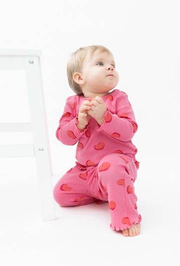 Różowe spodnie niemowlęce - flare - różowe w serduszka