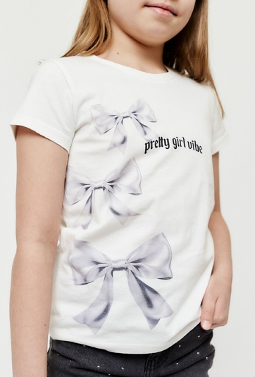 T-shirt  dziewczęcy biały z nadrukiem kokardek