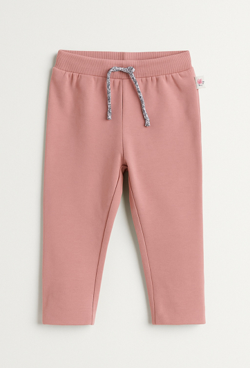 Różowe spodnie dresowe dziewczęce z wiązaniem