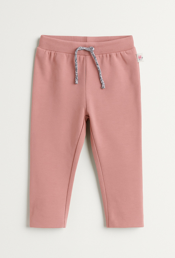 Różowe spodnie dresowe dziewczęce z wiązaniem