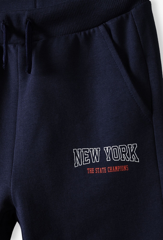 Granatowe spodnie dresowe slim dla chłopca New York - 5.10.15.