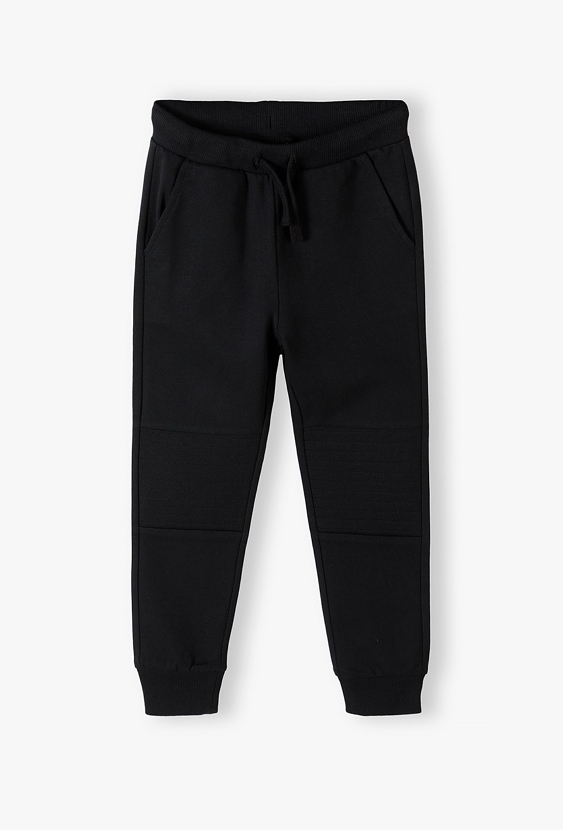 Spodnie dresowe chłopięce bawełniane –  chłopiec