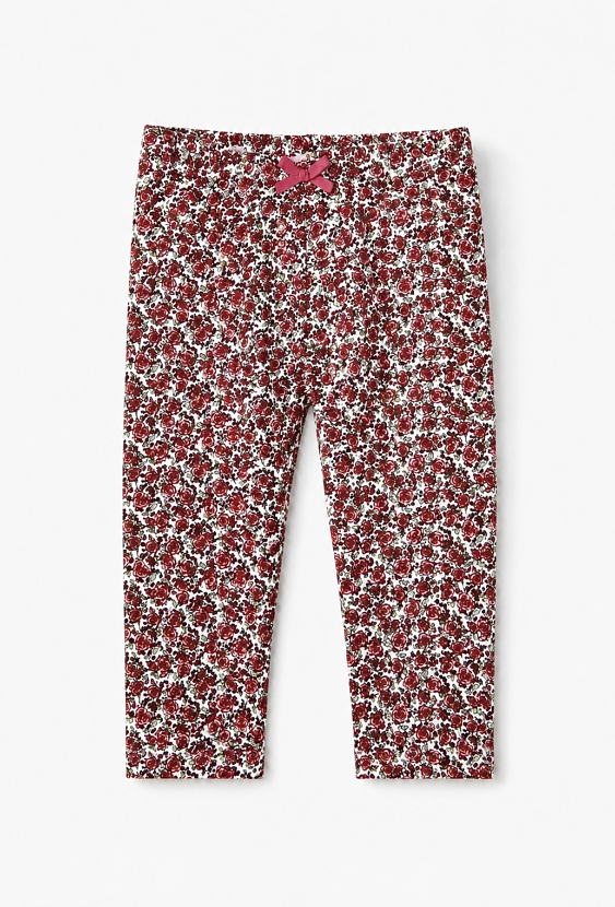 Legginsy niemowlęce z kwiatowym nadrukiem i kokardką