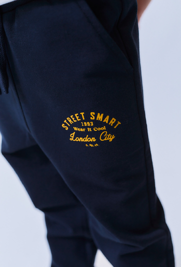 Chłopięce spodnie dresowe – granatowe