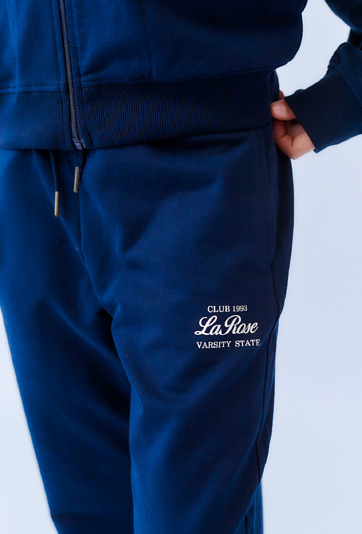 Spodnie dresowe dziewczęce granatowe z nadrukiem.