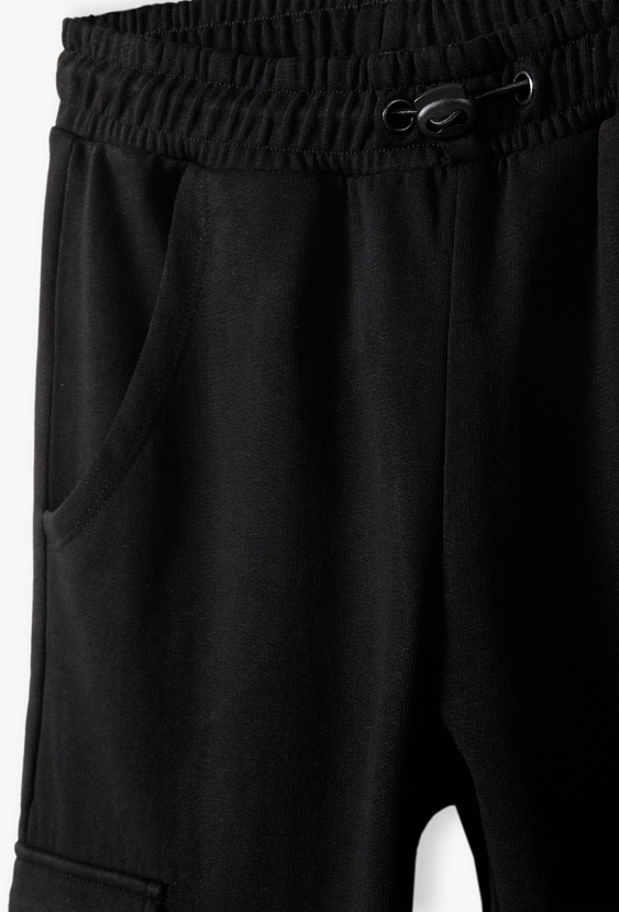 Czarne spodnie drasowe dla chłopca