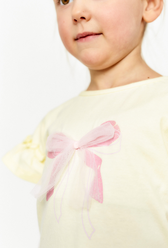 Koszulka z kokardką i falbankami