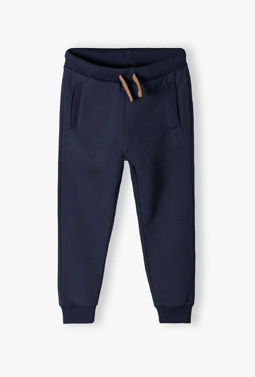 Ocieplane chłopięce spodnie dresowe -granatowe