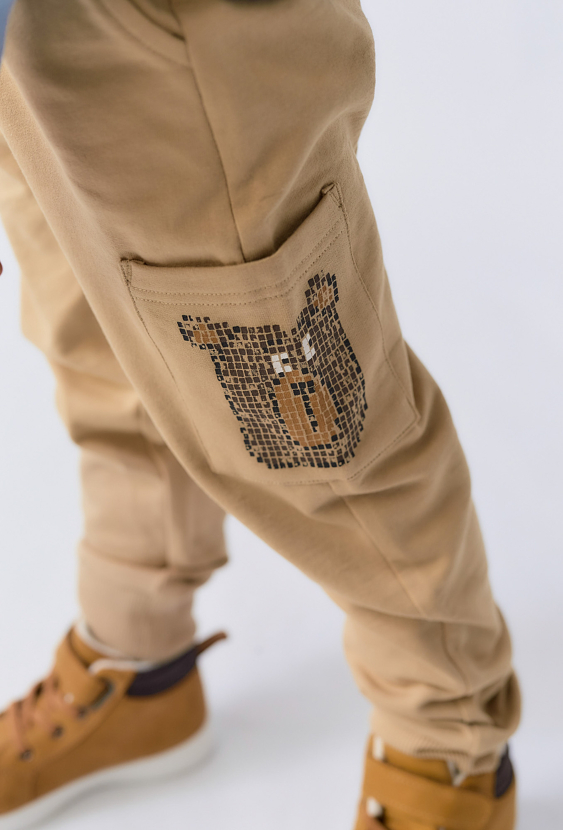 Chłopięce spodnie dresowe- beżowe