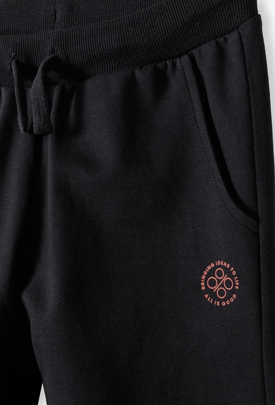 Szare spodnie dresowe regular chłopięce z miękkiej dzianiny