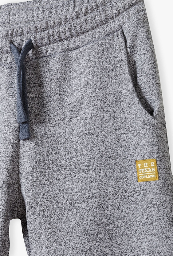 Dzianinowe spodnie dresowe dla chłopca - regular