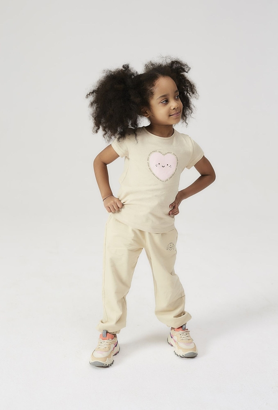 Spodnie dresowe dla dziewczynki - beżowe z pieskiem - 5.10.15.