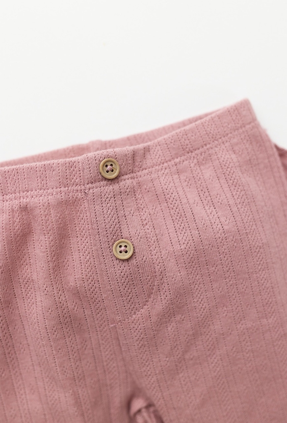 Różowe legginsy niemowlęce pointelle z falbanką