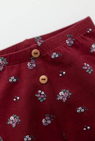 Czerwone legginsy niemowlęce w kwiatuszki z bawełny