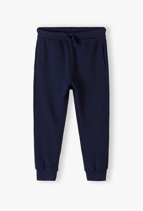 Granatowe spodnie dresowe pique dla chłopca - 5.10.15.