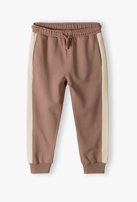 Spodnie dresowe dla chłopca z beżowymi lampasami