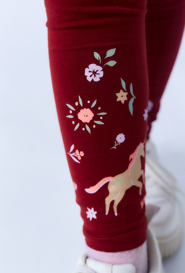 Legginsy dziewczęce bordowe z nadrukiem jednorożców