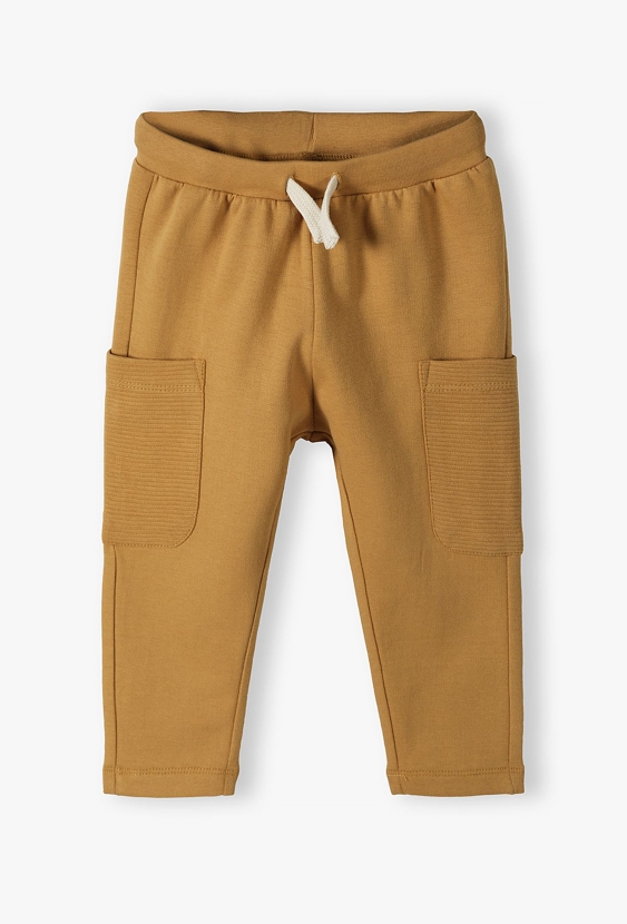 Bawełniane spodnie dresowe niemowlęce z kieszeniami