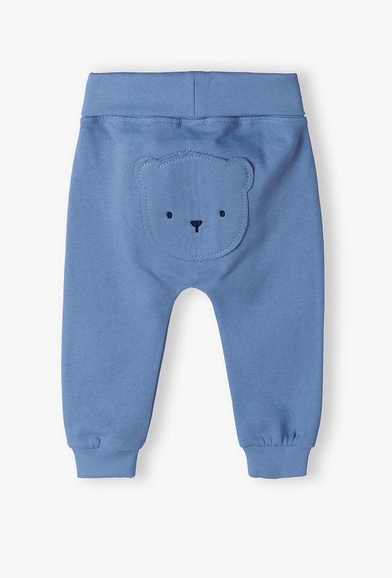 Ciepłe bawełniane spodnie niemowlęce z misiem - niebieskie