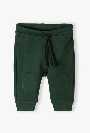 Zielone bawełniane spodnie dresowe niemowlęce - 5.10.15.