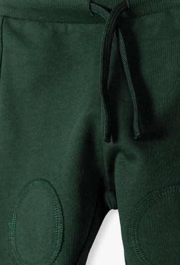 Zielone bawełniane spodnie dresowe niemowlęce - 5.10.15.