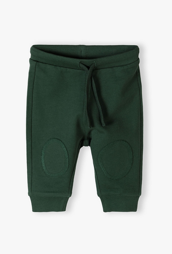 Zielone bawełniane spodnie dresowe niemowlęce - 5.10.15.