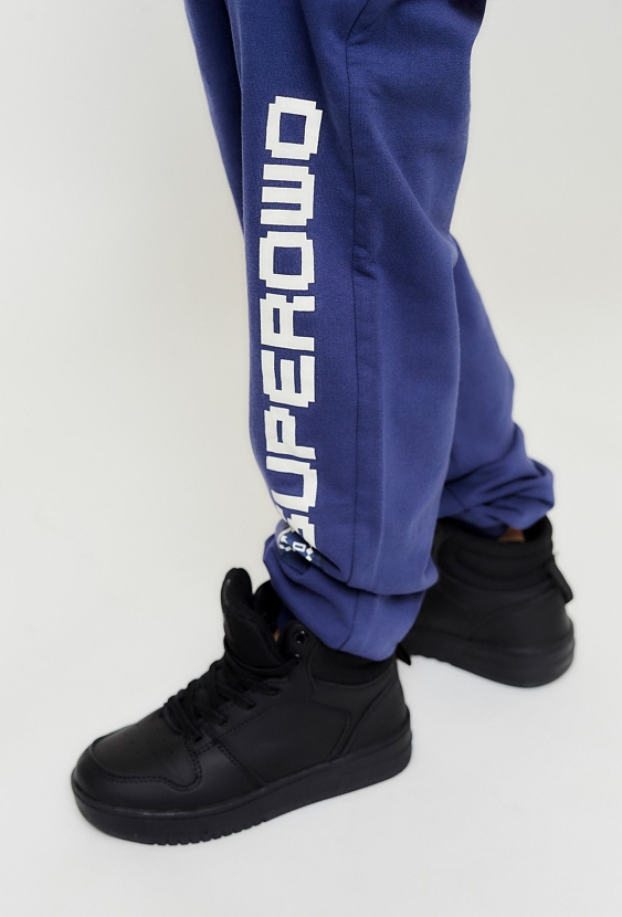 Niebieskie spodnie dresowe dla chłopca - Cosmic