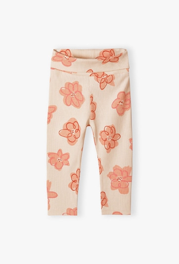 Legginsy niemowlęce w kwiaty z dzianiny prążkowanej