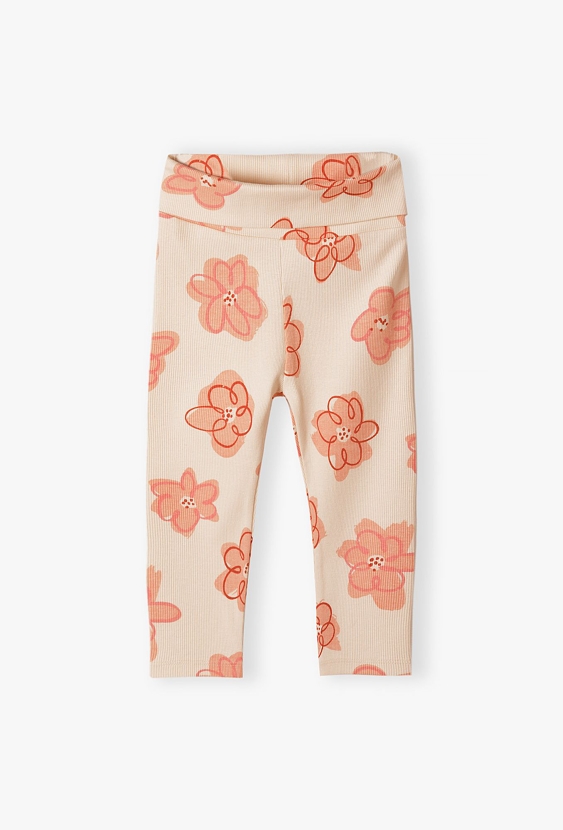 Legginsy niemowlęce w kwiaty z dzianiny prążkowanej