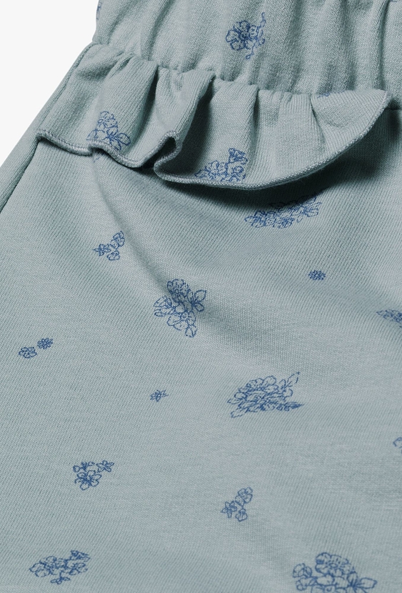 Bawełniane spodnie niemowlęce - niebieskie w kwiaty