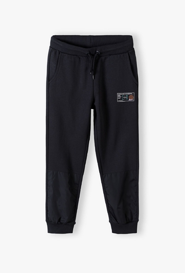 Spodnie dresowe ocieplane dla chłopca regular- czarne
