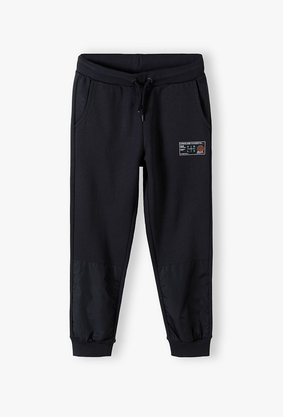 Spodnie dresowe ocieplane dla chłopca regular- czarne