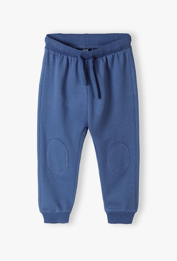 Spodnie dresowe dla niemowlaka - niebieskie z łatami - 5.10.15.