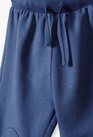 Spodnie dresowe dla niemowlaka - niebieskie z łatami - 5.10.15.