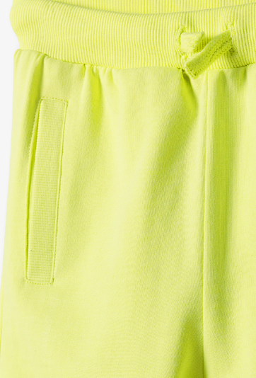 Dresowe spodnie limonkowe slim dla dziecka - 5.10.15.