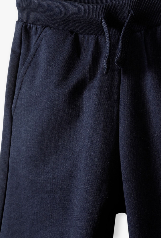 Spodnie dresowe dla chłopca - granatowe