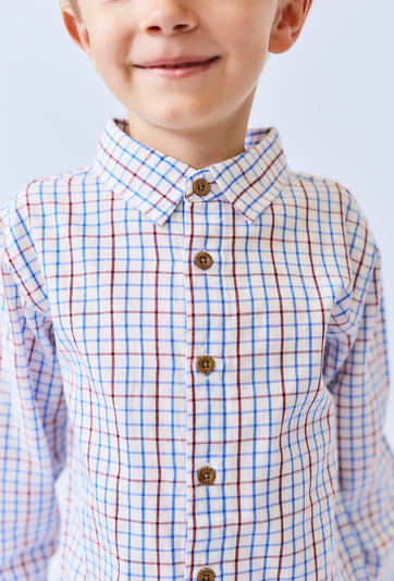 Biała koszula chłopięca w kratkę z długim rękawem