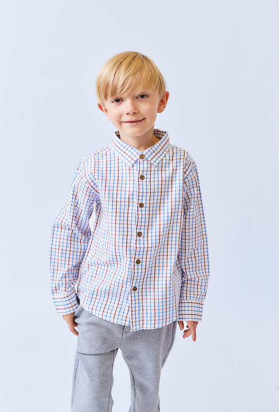Biała koszula chłopięca w kratkę z długim rękawem