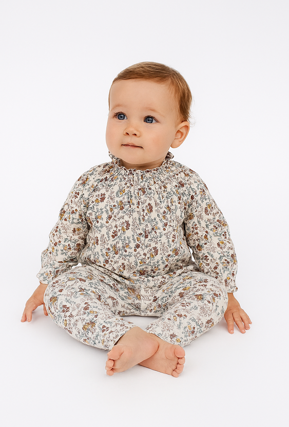 Koszula niemowlęca z długim rękawem i kwiatowym printem.