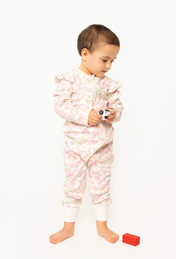 Pajac niemowlęcy dla dziewczynki – kwiatowy wzór